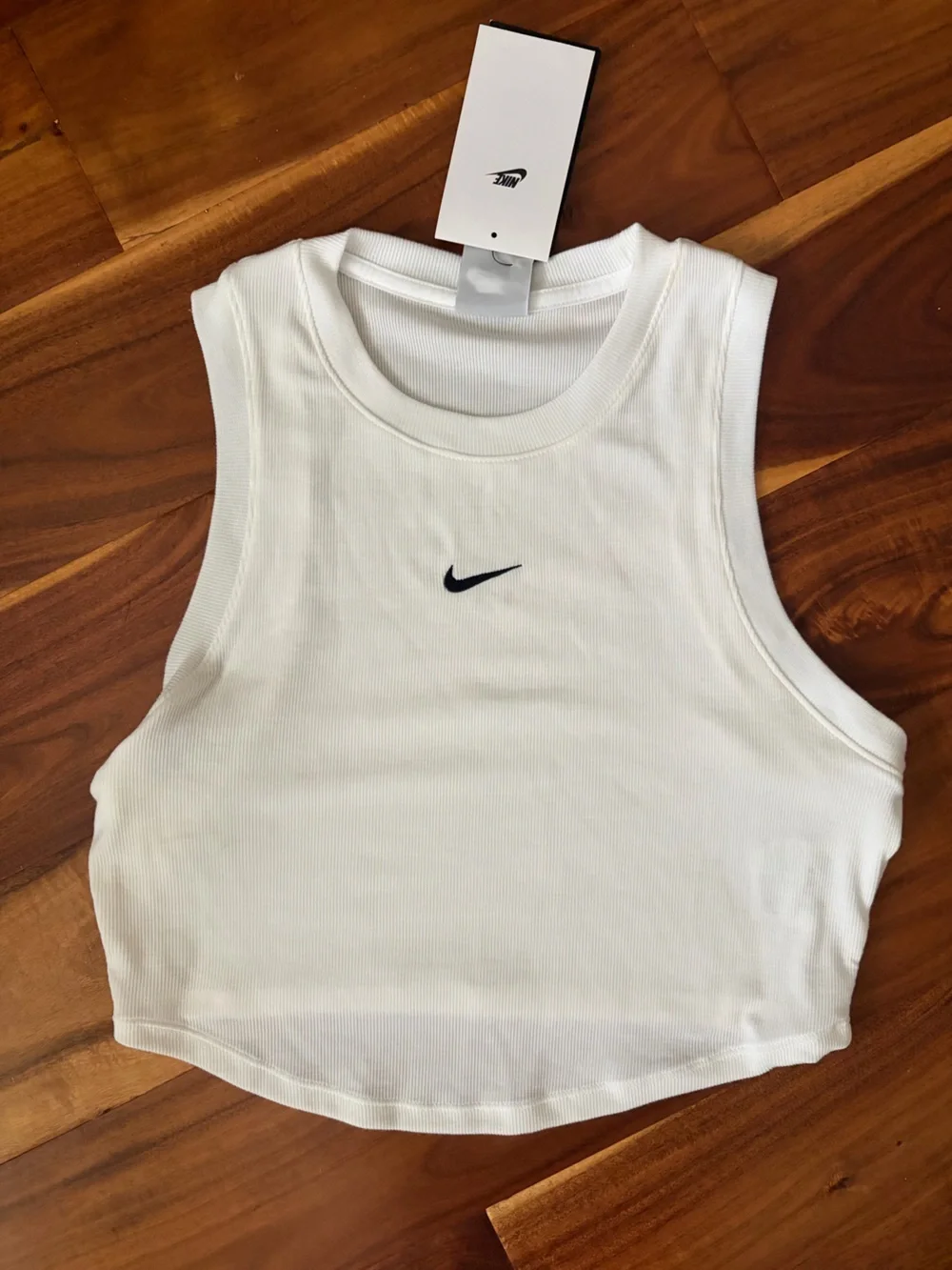 Nike women’s cropped white Ribbed Tank Top with Black Swoosh Small size NWT